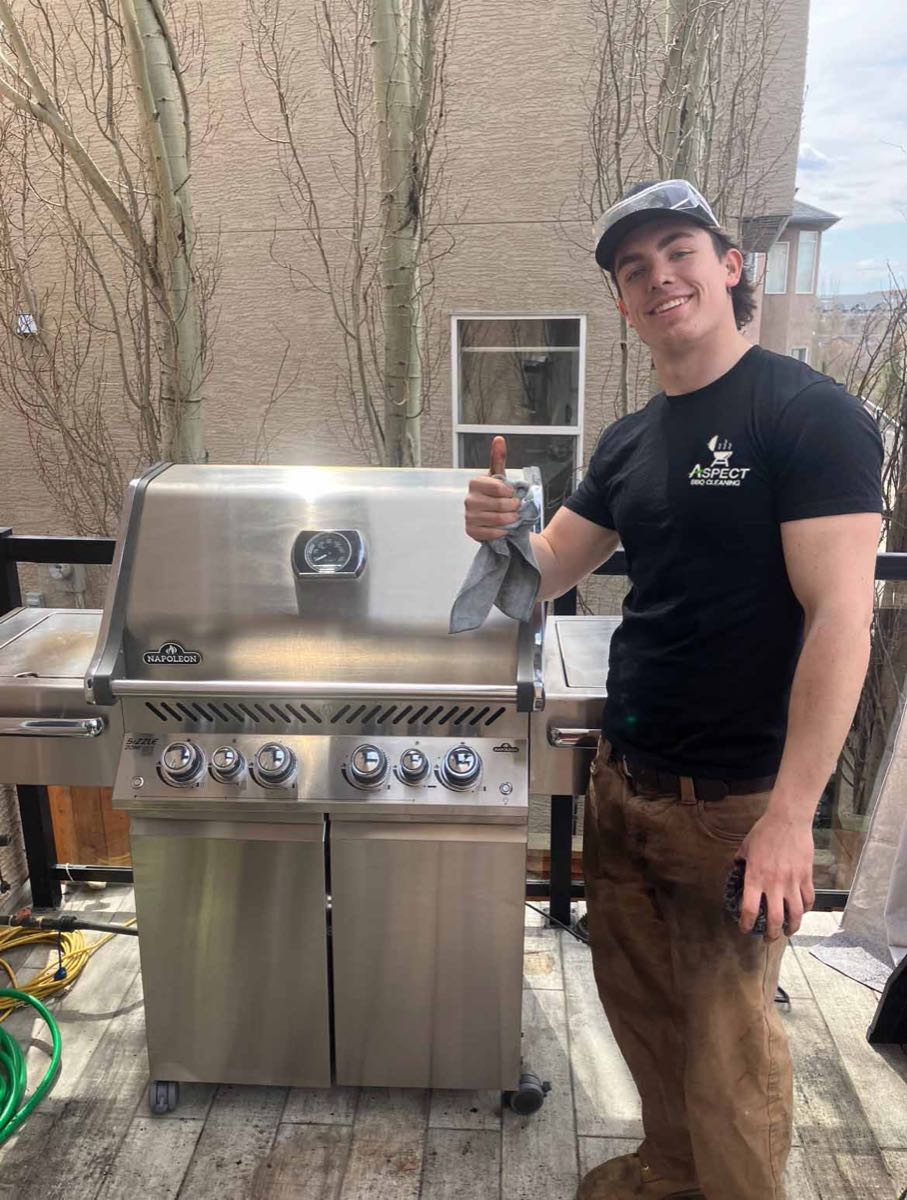 Aspect technician with a freshly detailed Napoleon grill